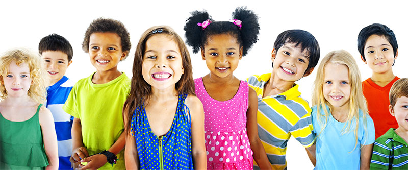 The image shows a diverse group of children posing together with smiles on their faces, against a white background.